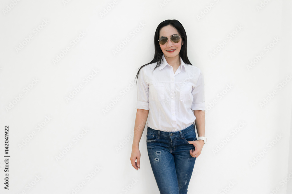 Asian young woman thinking beautiful smile put a white shirt stand of on white background.
Asian young woman thinking beautiful smile put a white shirt stand of on white background.
