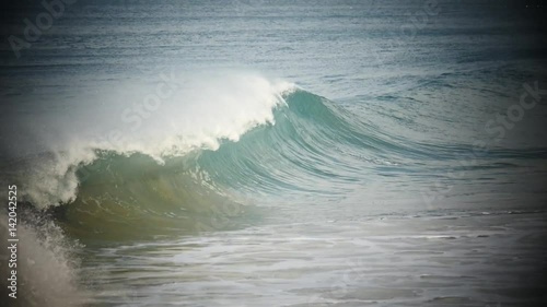 Ocean coast with waves and rocks photo