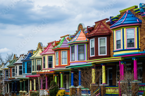Colorful row houses along Guilford Avenue in Charles Village, Baltimore, Maryland. photo