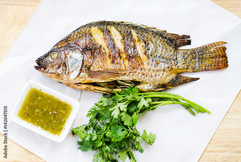 Grilled fish and spicy seafood sauce Grilled fish and spicy seafood sauce