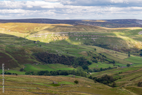 Landscape and clouds in the Yorkshire Dales, seen from the Buttertubs Pass between Thwaite and Simonstone, North Yorkshire, UK