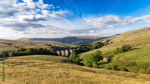 Dent Head Viaduct and clouds, Yorkshire Dales near Cowgill, North Yorkshire, UK photo