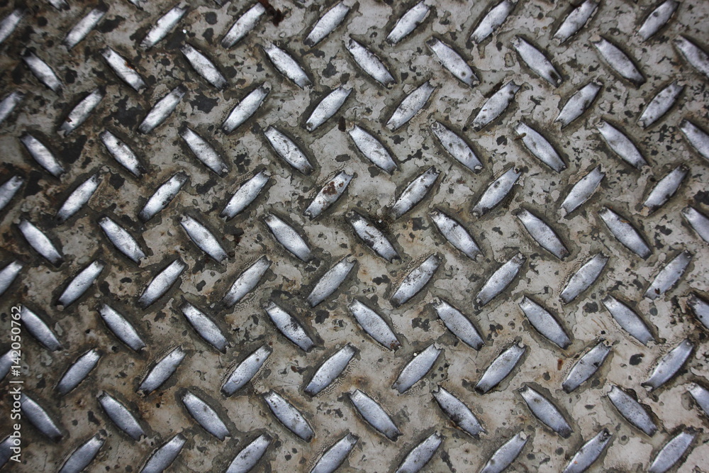 Diamond tread steel floor plate texture (dirty and worn) Diamond tread steel floor plate texture (dirty and worn)