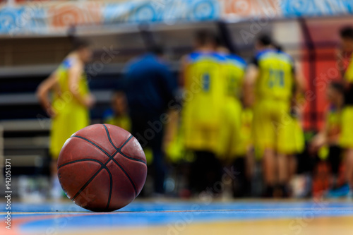 Basketball ball on the wooden floor