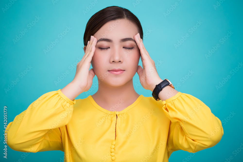 Woman has headache Woman has headache