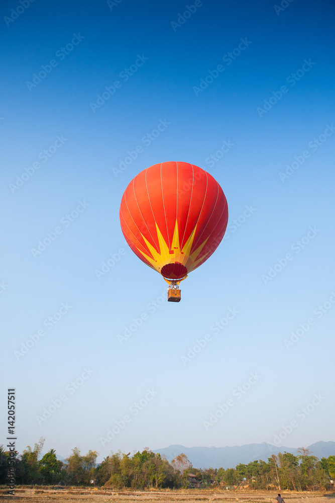 Obraz premium Hot air balloon on sky in Laos