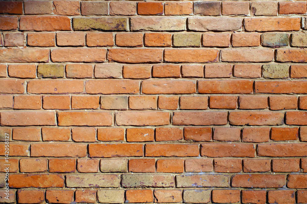 Orange dirty brick wall background. Orange dirty brick wall background.