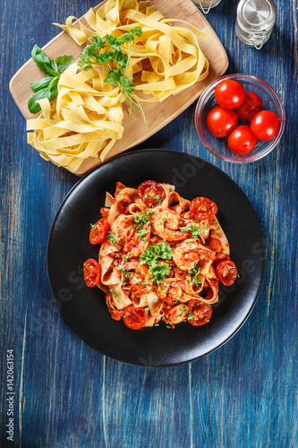 Pappardelle pasta with shrimp, tomatoes and herbs