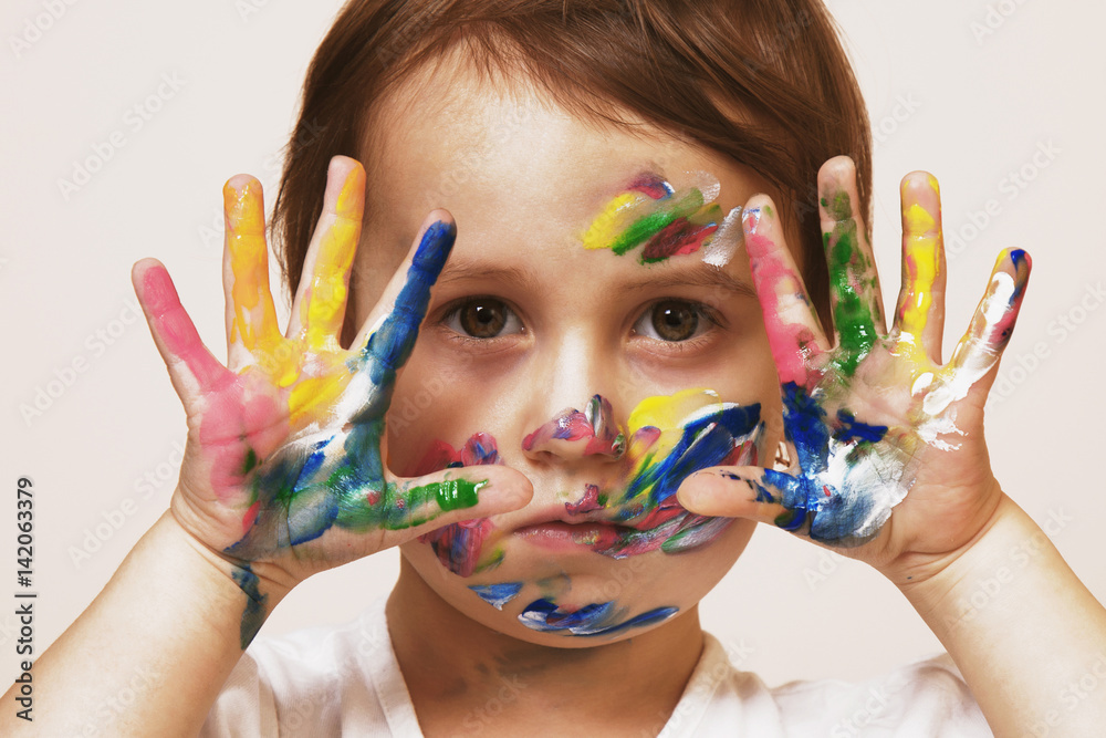 Colorful painted hands in a beautiful little child girl (art, childhood, colour concept) Colorful painted hands in a beautiful little child girl (art, childhood, colour concept)