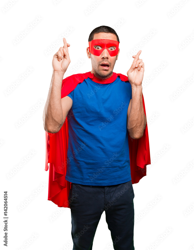 Hopeful superhero finger cross gesture Hopeful superhero finger cross gesture