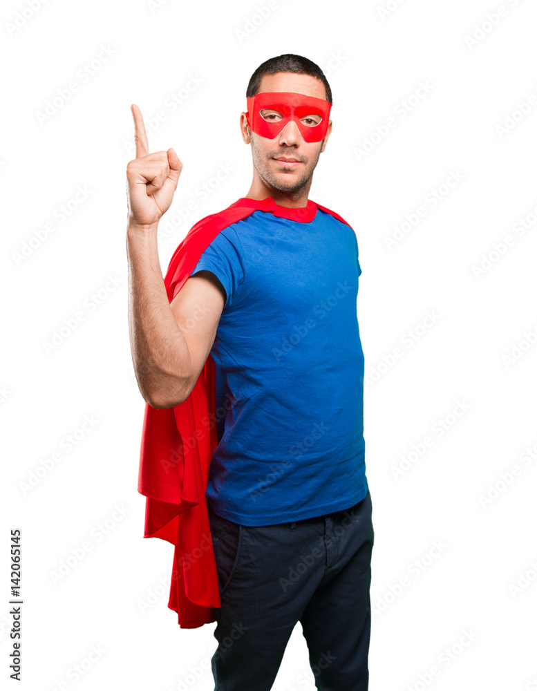 Fototapeta premium Winner superhero with number one gesture