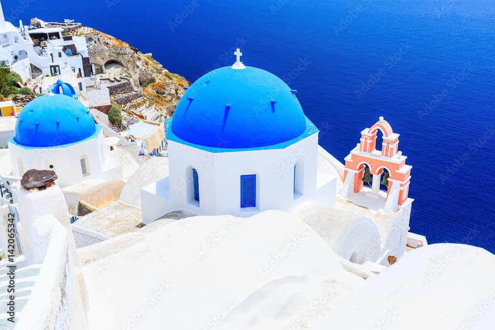 Santorini, Greece. Blue dome churches of Oia (Ia) village.