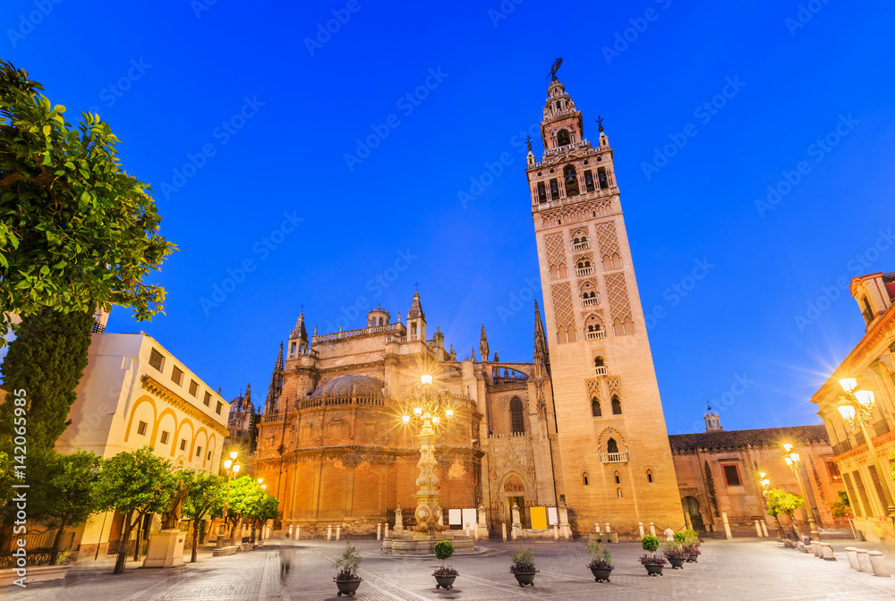 Seville, Spain. Cathedral of Saint Mary of the See with the Giralda bell tower.