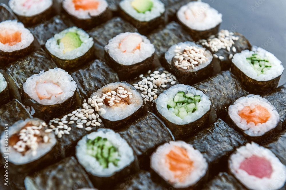 Sushi net on a black surface. Flat lay Sushi net on a black surface. Flat lay