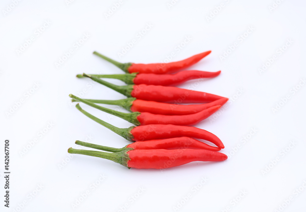 Red hot chili peppers on white background