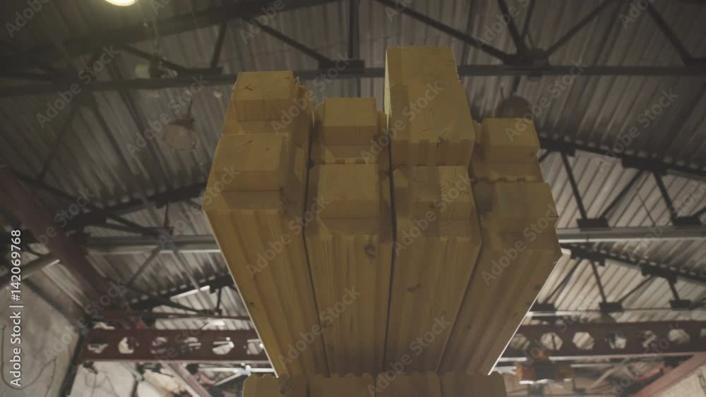 Ready glulam folded neatly in a pile. Engineered stressrated product created by bonding