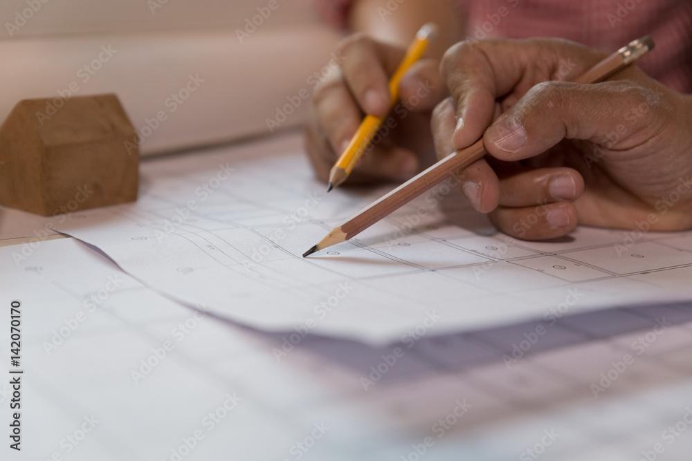 Architect or engineer meeting, working with blueprints in office, Construction concept. Architect or engineer meeting, working with blueprints in office, Construction concept.