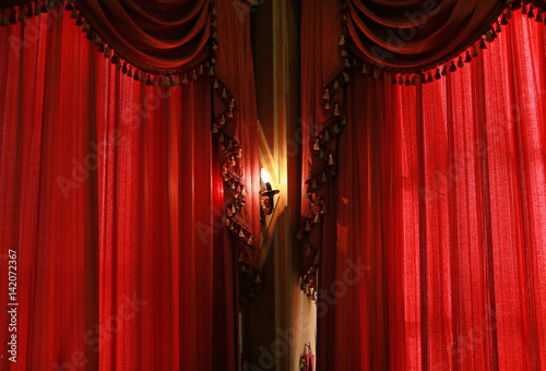 Red curtain fabric with light
