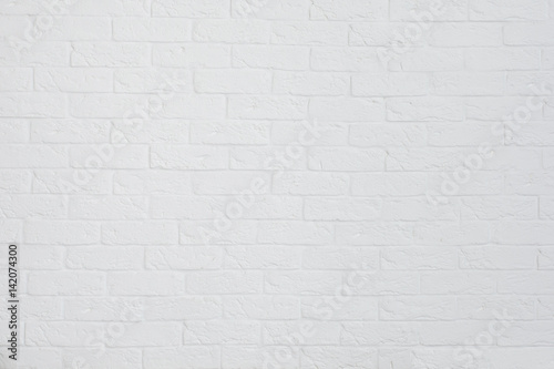 Brick painted white wall background