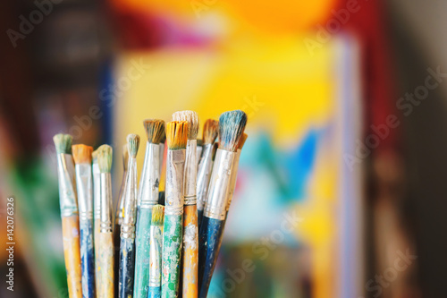 Paint Brushes isolated in colorful backgraund, close-up