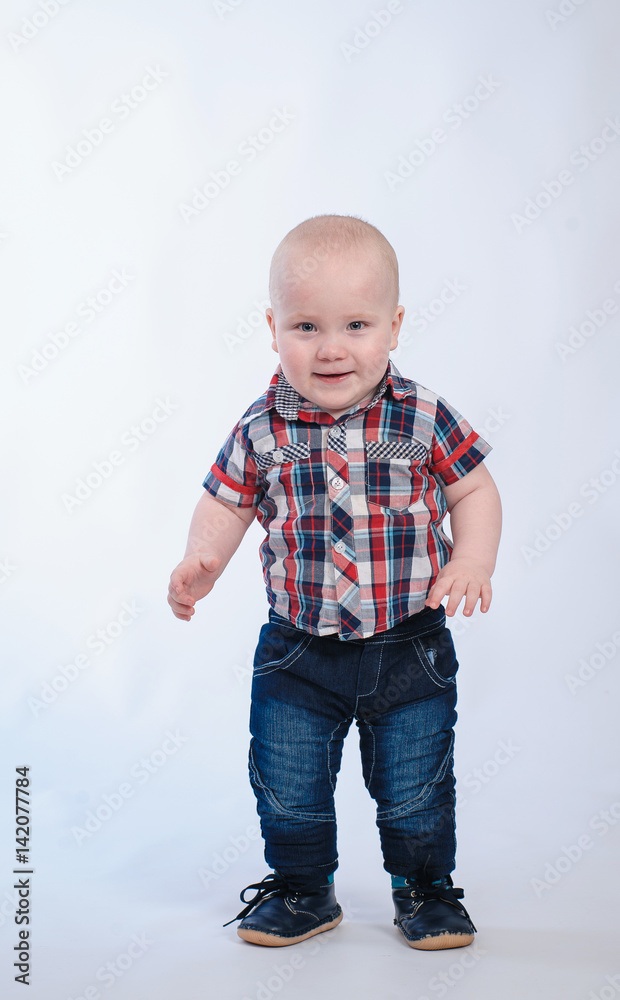 Baby boy in plaid shirt