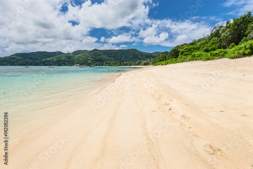 Wide angle view of tropical beach Anse Royale at Mahe island, Seychelles - vacation background