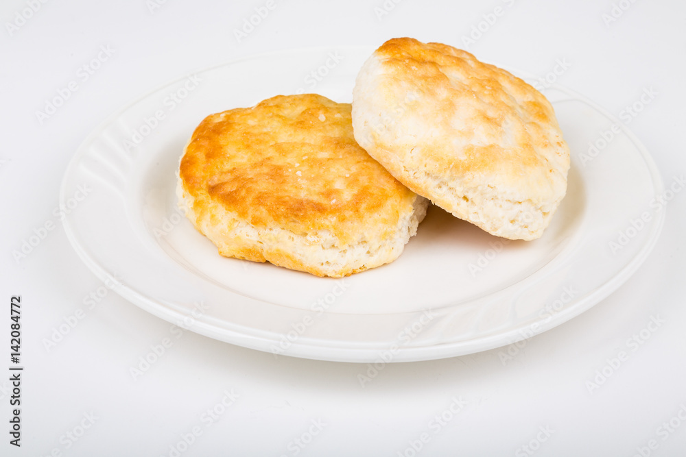Two Fluffy Biscuits on a White Plate