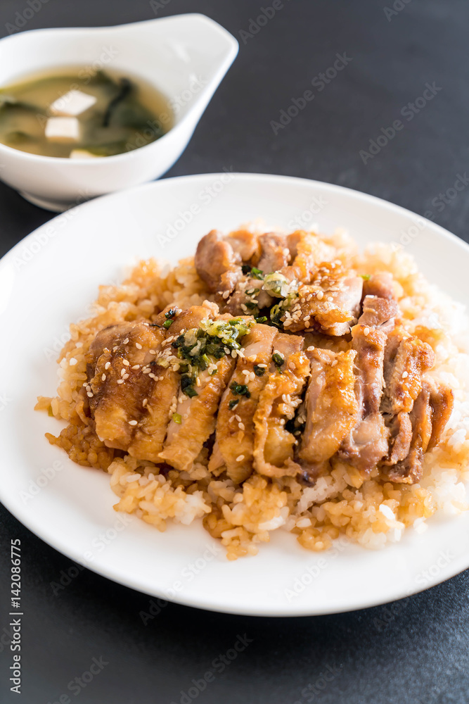 teriyaki chicken on topped rice with miso soup