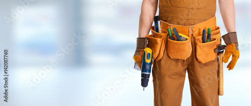 Construction worker with drill
