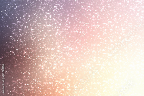 Magic Festive warm background. Bokeh light and sun. Christmas glitter lights