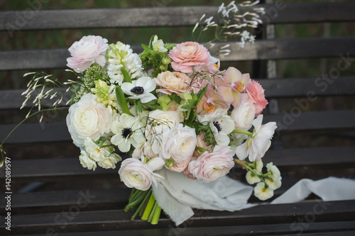 Beautiful wedding rustic bouquet with white roses. © popovich22