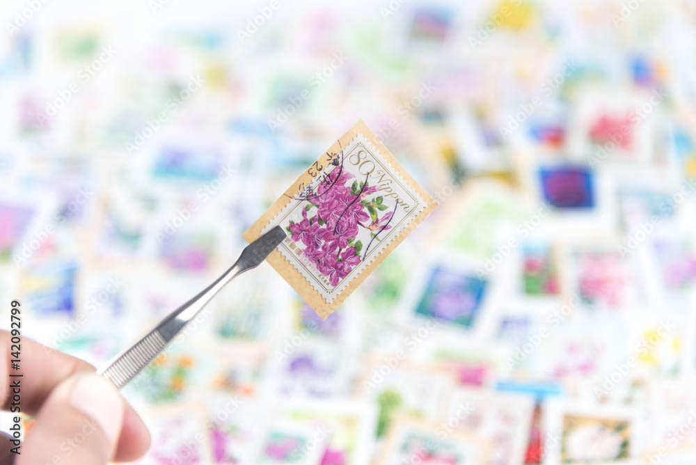 A stamp printed in Japan shows various flowers collection