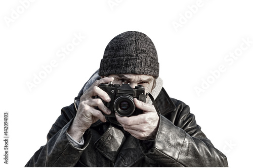 Photographer with retro photo camera isolated on white background.