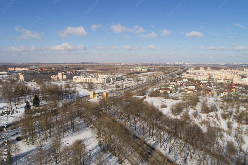 Aerial fly over spring Saint-Petersburg suburb Pushkin town view on streets daytime