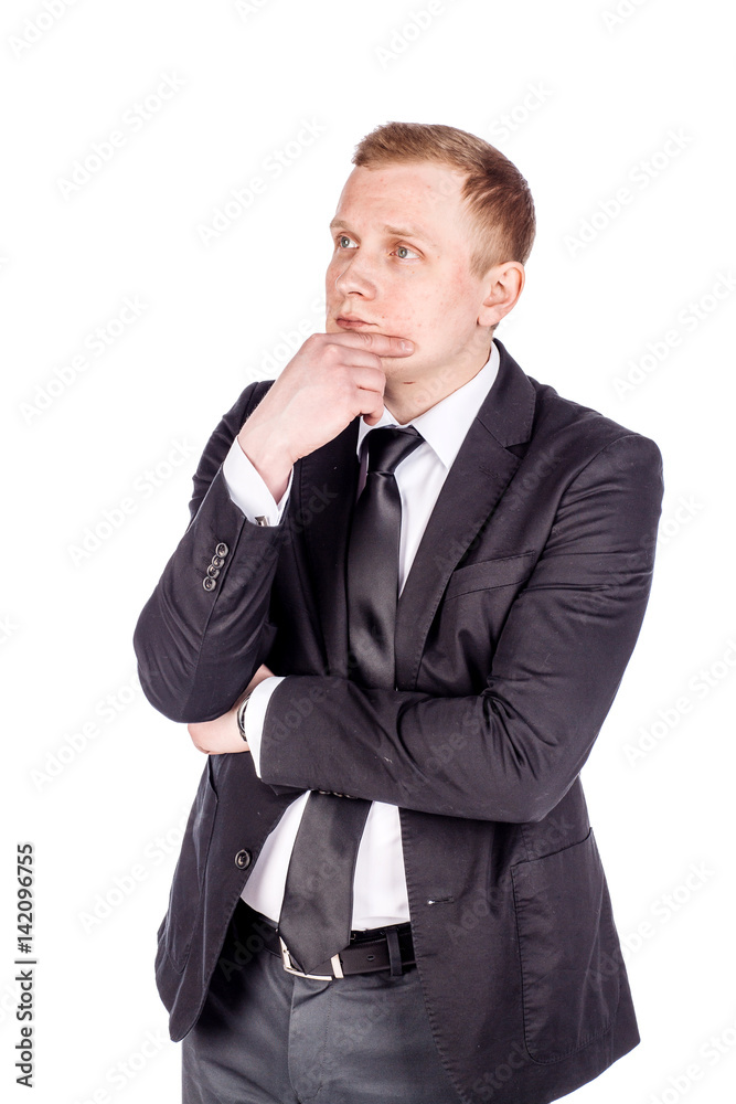 young business man with suspicious emotion. human emotion expression and lifestyle concept. image on a white studio background. young business man with suspicious emotion. human emotion expression and lifestyle concept. image on a white studio background.