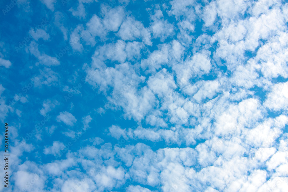 blue sky and fluffy clouds (Cirrocumulus) on nature background texture 
