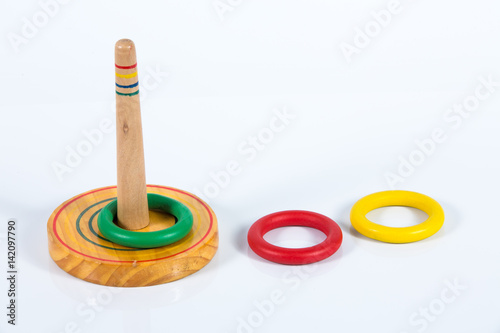 Quoits, wooden toy isolated on white background
