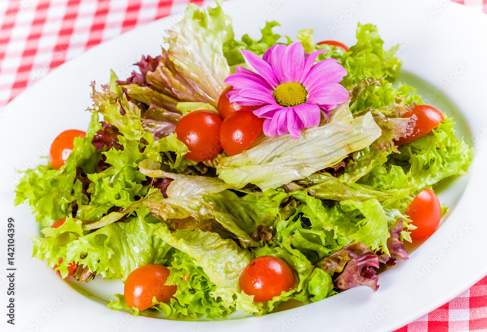 Salad witth lettuce leaves and cherry tomato Salad witth lettuce leaves and cherry tomato