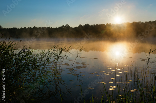 Sunrise over  Lake Sawinda Wielka. Masuria. Poland.