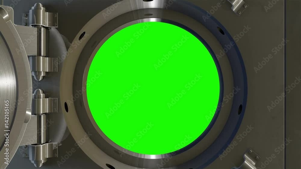 Bank vault door at bank opening to green screen as camera pushes into the banks safe. 