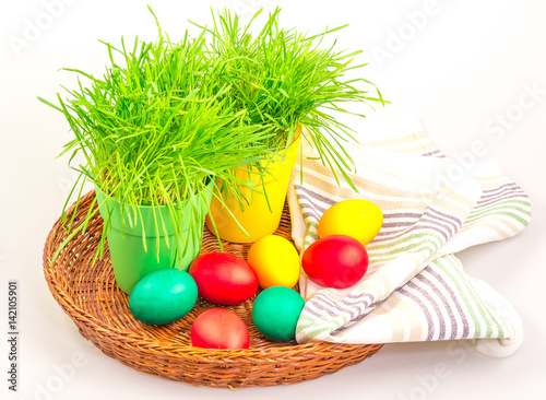 Easter eggs with grass and towel