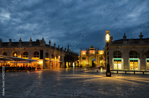 The Arc de Triomphe on Stanislas Square in Nancy. Lorraine. France. Evening scene, the lights are on. photo