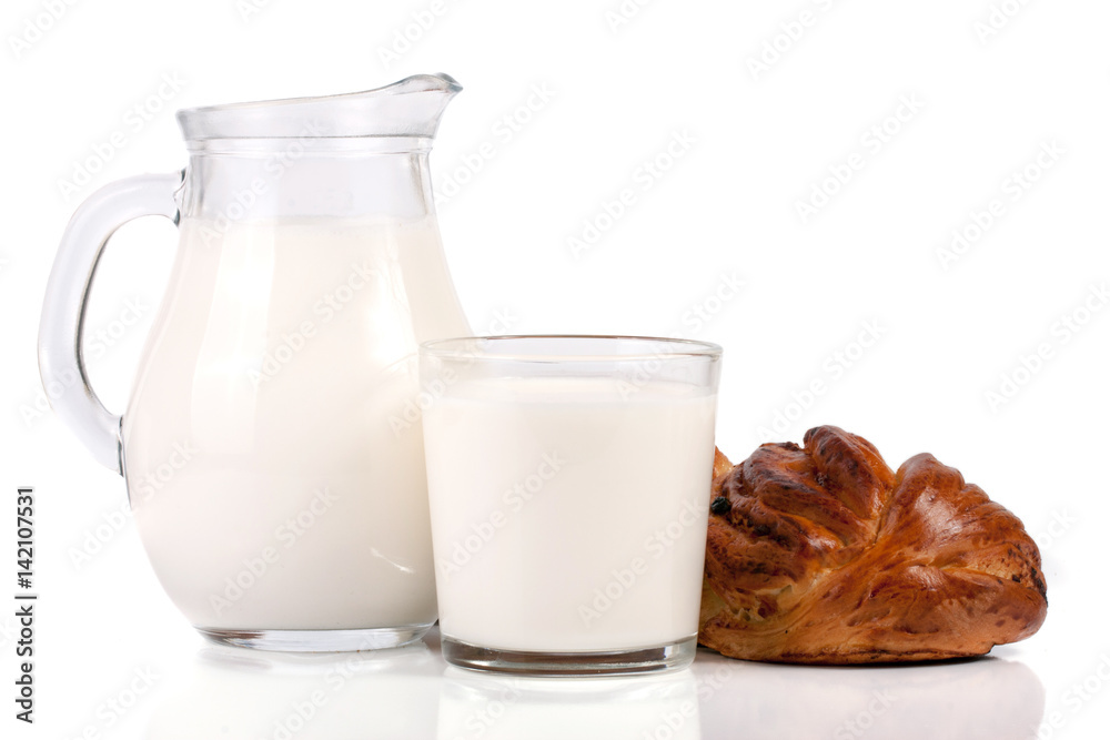 jug and glass of milk with a loaf of bread isolated on white background jug and glass of milk with a loaf of bread isolated on white background