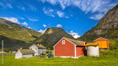 Barns in a norwegian farm village photo