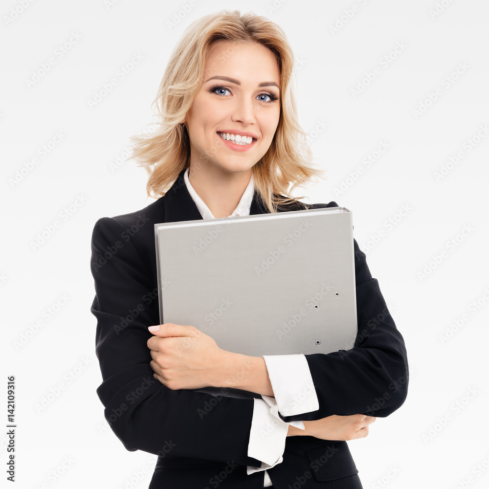 Young smiling businesswoman with grey folder Young smiling businesswoman with grey folder