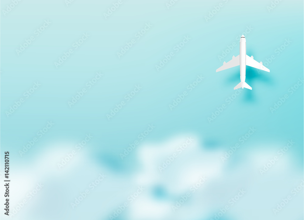plane on sky with ocean background