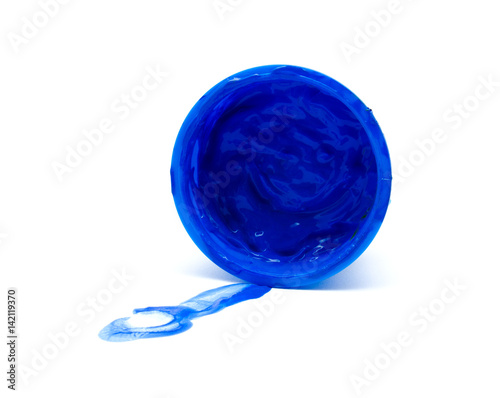 Blue color paint in a jar on white background