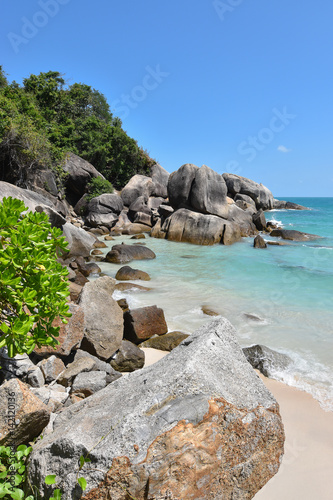 Koh Samui, Thailand. Crystal Bay beach - Silver Beach. Idyllic seascape with rocks and beautiful blue shallow water. 