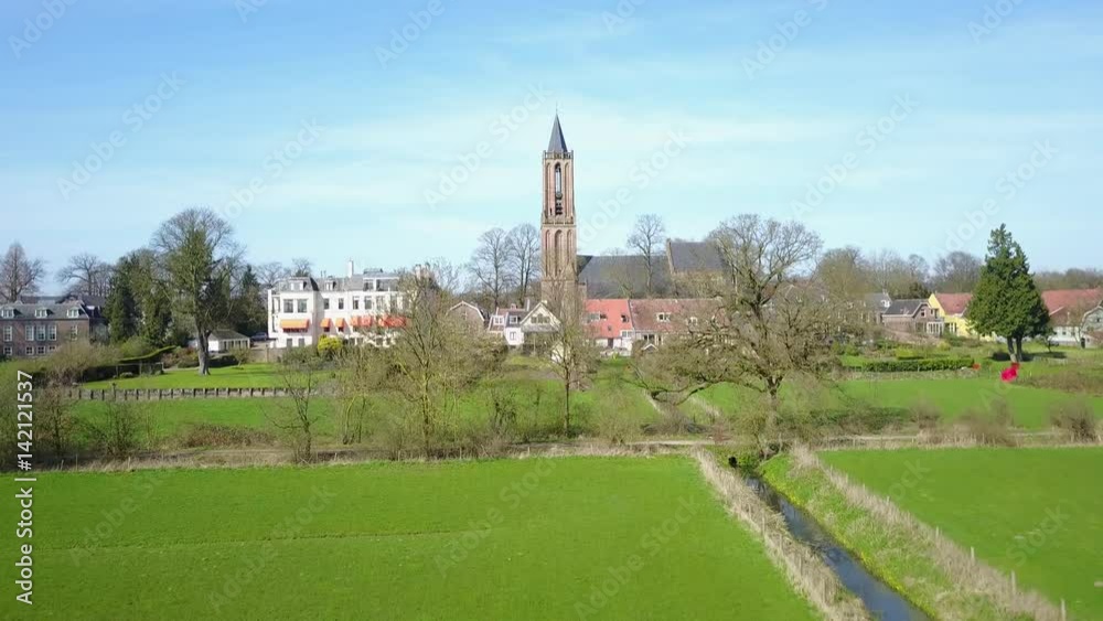 Aerial: Flying up to the church of Amerongen in the Netherlands Aerial: Flying up to the church of Amerongen in the Netherlands