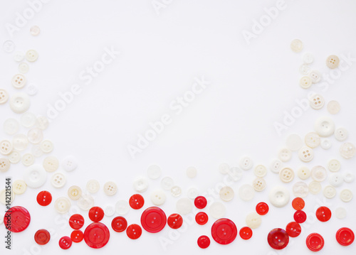 Background of multi-colored buttons. Abstract background. Pattern of buttons on a white background.